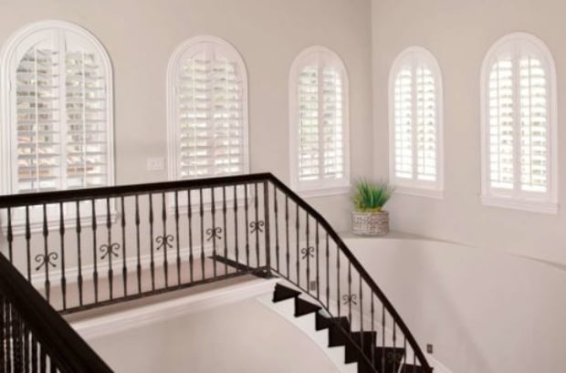 Plantation shutters over a stairwell